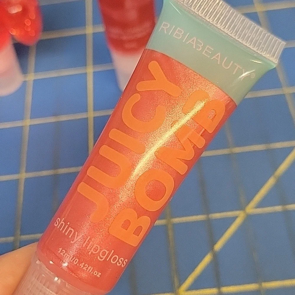 Lot of 4  Lip Gloss & Plumper New
